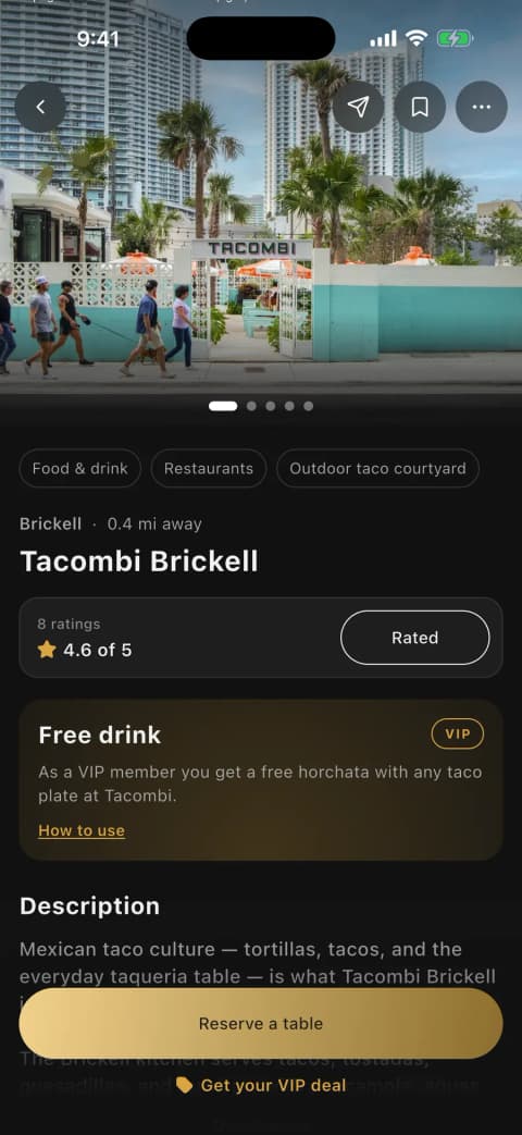 A venue page in the Vennu app with photos, opening hours and member ratings